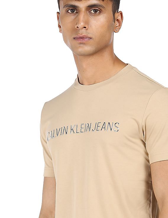 Beige calvin klein outlet t shirt