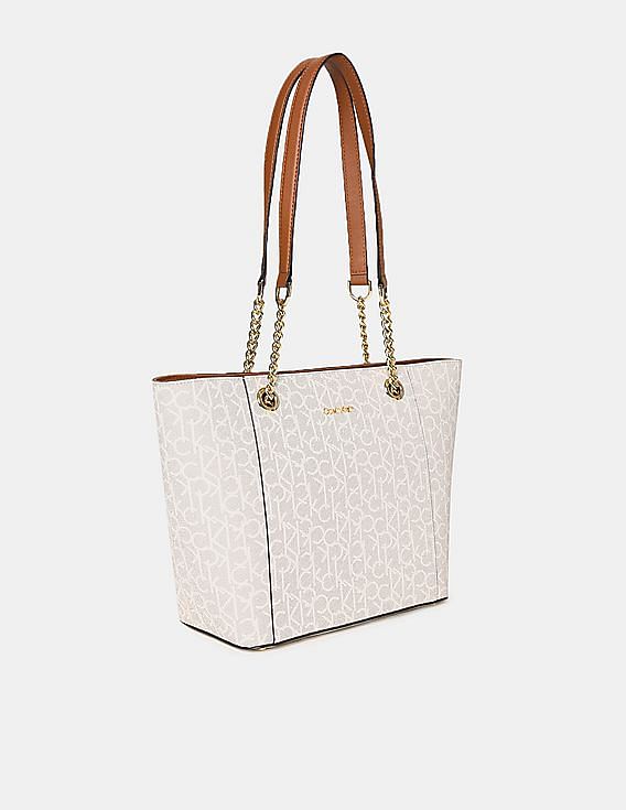 Buy Calvin Klein Women Off White And Brown Metallic Chain Trim Strap  Allover Monogram Tote Bag - NNNOW.com