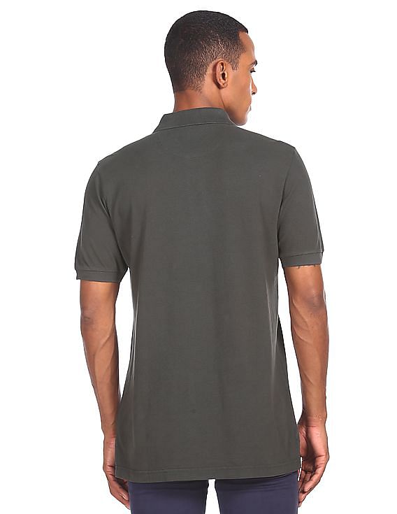 U.S. Polo Assn. Ribbed Collar Solid Polo Shirt