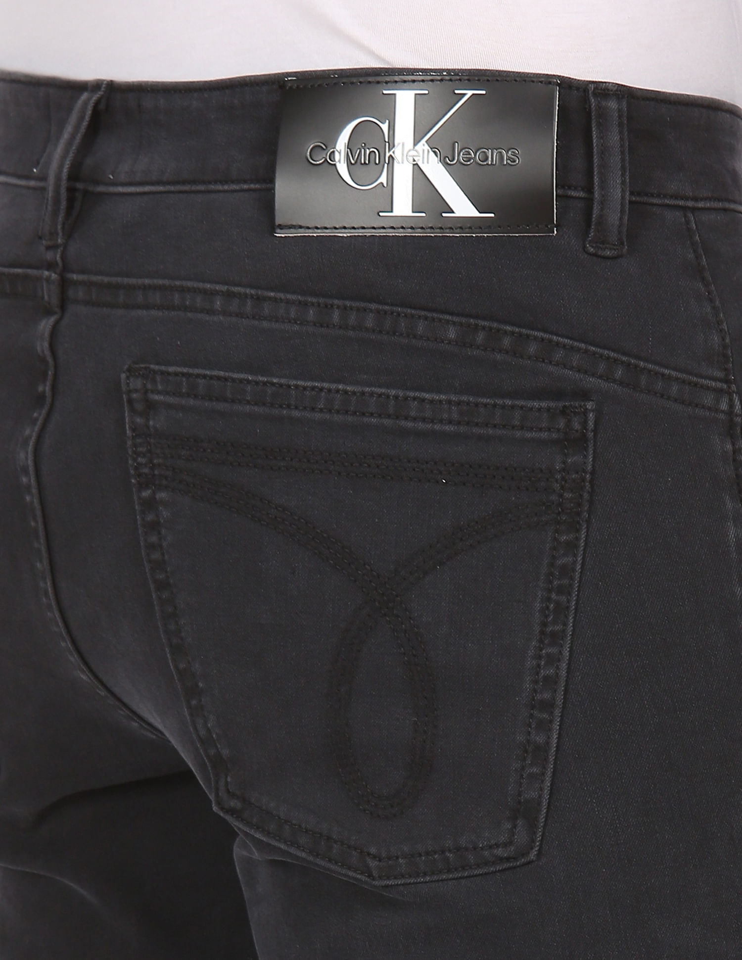 Buy Calvin Klein Jeans Men Black Mid Rise Body Fit Jeans Buy Calvin Klein Jeans Men Black Mid Rise Body Fit Jeans
