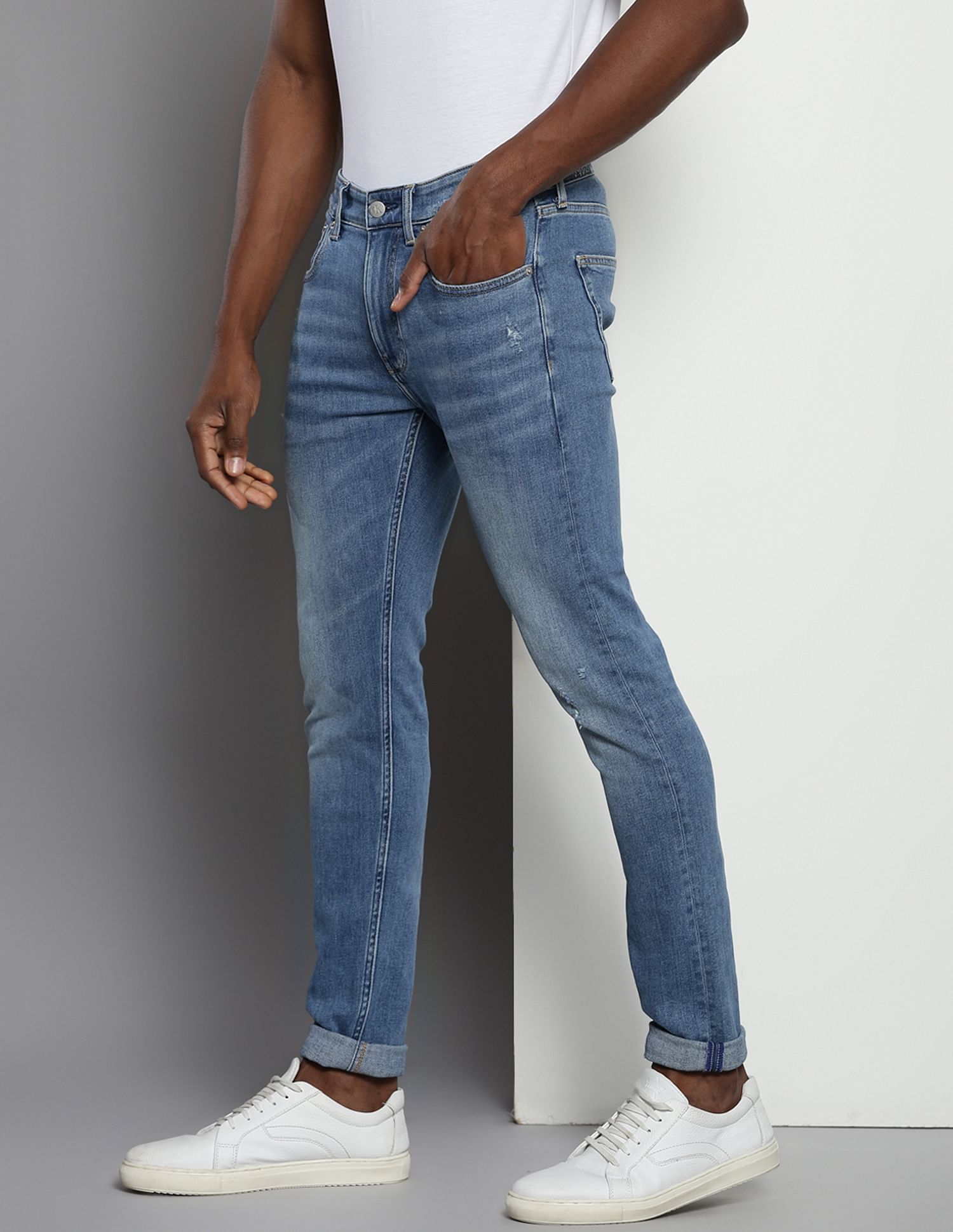 Calvin Klein Modern Tapered Fit Distressed Jeans