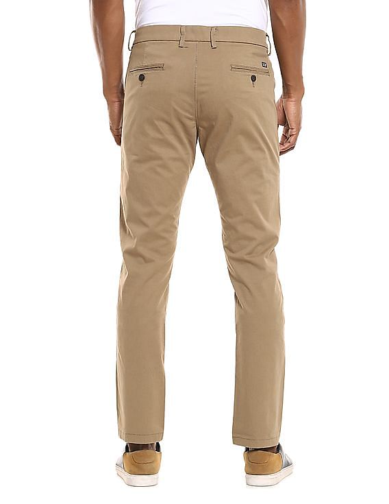 Arrow Sports Casual Trousers  Buy Arrow Sports Men Light Khaki Mid Rise  Textured Casual Trousers Online  Nykaa Fashion