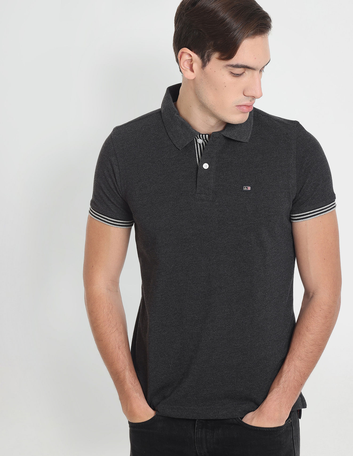 Arrow Sports Striped Sleeve Hem Heathered Polo Shirt