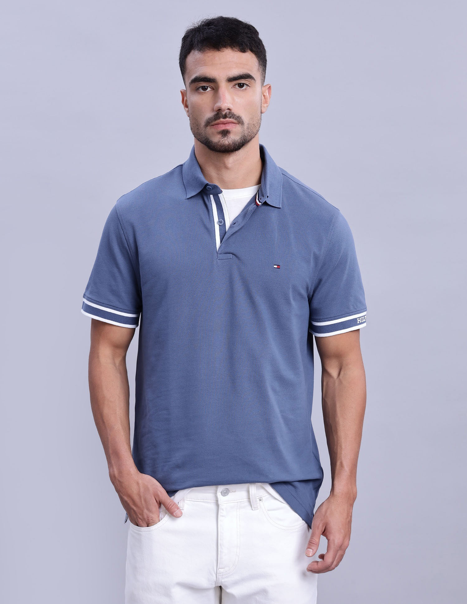 Tommy Hilfiger Mens Blue Solid Polo Shirt