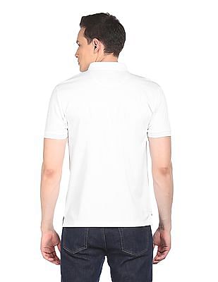 Buy . Polo Assn. Men White Solid Cotton Polo Shirt 