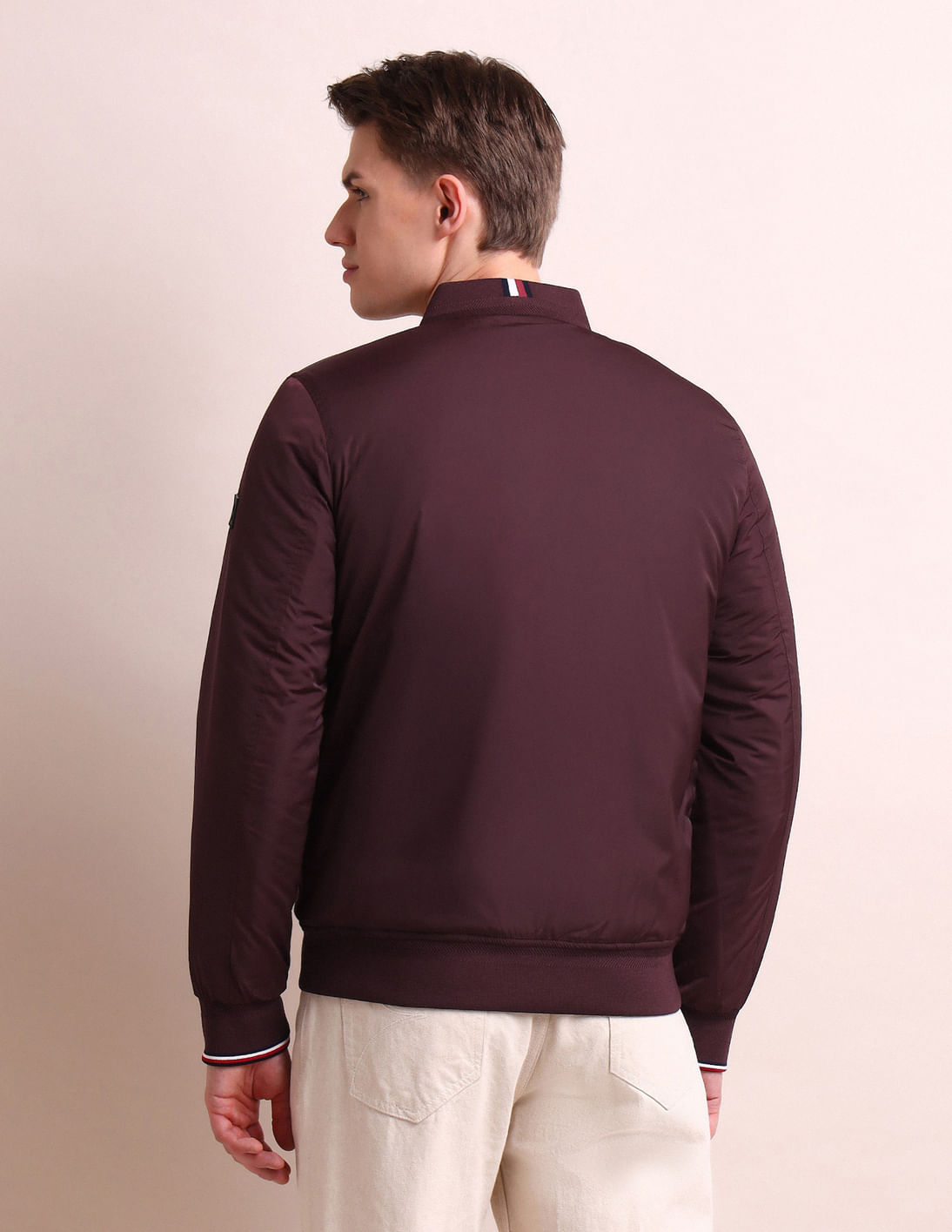 Buy Arrow Sports Stand Neck Solid Bomber Jacket - NNNOW.com