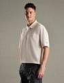 Tommy Hilfiger Solid Regular-Fit Cotton Polo Shirt