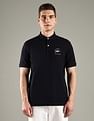 Tommy Hilfiger Solid Regular Fit Cotton Polo T-Shirt