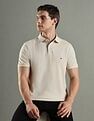 Tommy Hilfiger Solid Regular Fit Cotton Polo T-Shirt