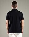 Tommy Hilfiger Solid Regular Fit Cotton Polo T-Shirt